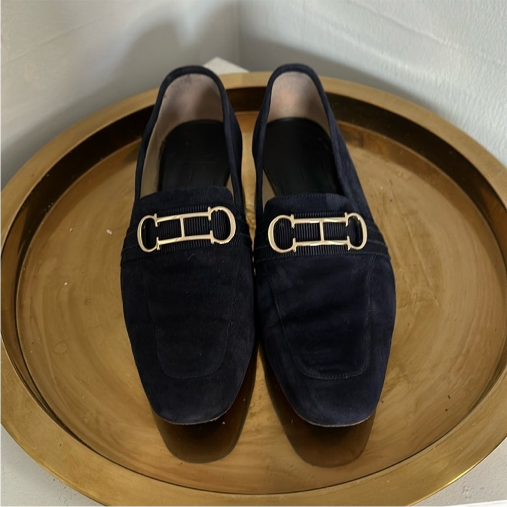 Carolina Herrera Black and Gold Loafers with Sleek Design
